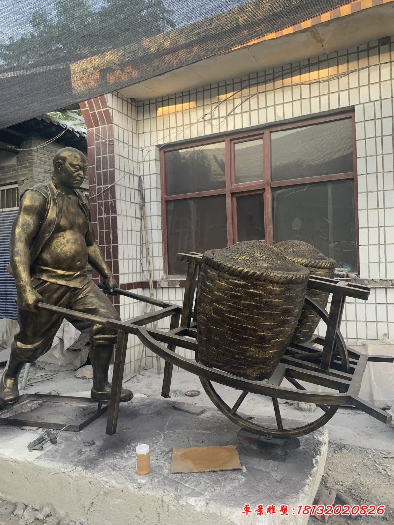 農耕主題推車人物銅雕
